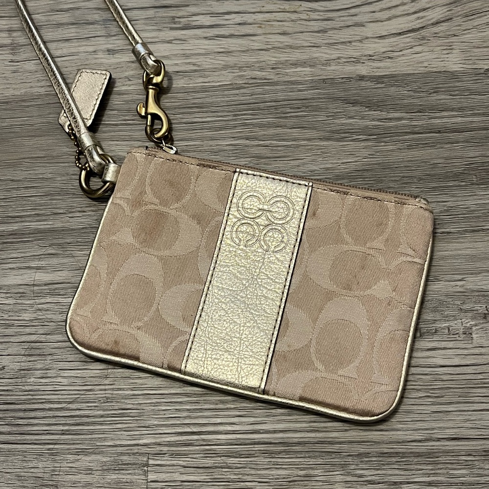 Coach Elegant Tan Wristlet with Gold Detail